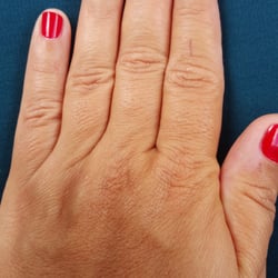 Cherry blossom. Really pretty red mani.