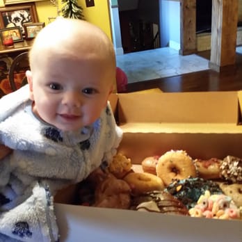 Hurts Donuts - Baby Redd enjoying his hurts doughnuts! - Donuts Near Me - Springfield, Missouri Hurts Donuts - Baby Redd enjoying his hurts doughnuts! - Donuts Near Me - Springfield, Missouri