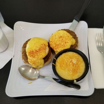 Jester's Café - Country Eggs Benedict w/ Cheesy Grits - New American Near Me - Wilmington, North Carolina Jester's Café - Country Eggs Benedict w/ Cheesy Grits - New American Near Me - Wilmington, North Carolina