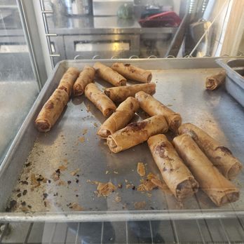 Thanh Huong - A tray of eggrolls in their warming display - Vietnamese Near Me - San Jose, California