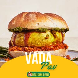 Desi Dish Dash - Vada Pav: Mumbai's iconic spiced potato fritter in a soft bun, bursting with textures and sweet & spicy chutneys.