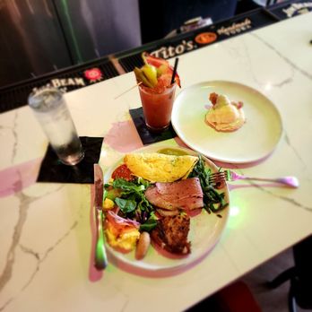 Frog & The Bull - Pork belly Benny, brisket, lox with spring mix & caper berries & the most beautiful bloody Mary with ALL THE FIXIN'S - Tapas Bars Near Me - Austin, Texas Frog & The Bull - Pork belly Benny, brisket, lox with spring mix & caper berries & the most beautiful bloody Mary with ALL THE FIXIN'S - Tapas Bars Near Me - Austin, Texas