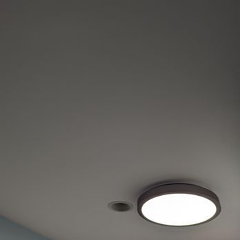 Alcon Home Improvement - This is our bathroom ceiling now, with unnecessary heater removed but with new exhaust fan/LED light installed, and new plaster and paint. - Painters Near Me