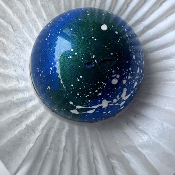 Aurora Chocolate - Hand painted confection (dark chocolate candy forgot what it was filled with. - Chocolatiers & Shops Near Me - Anchorage, Alaska