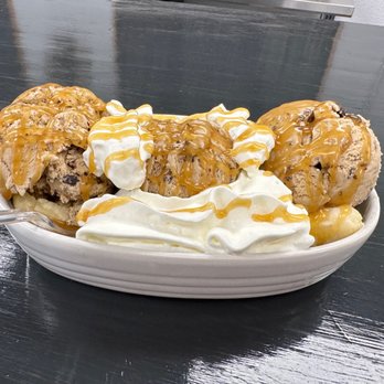 The Scoop Ice Cream - a banana split with caramel sauce and whipped cream - Ice Cream & Frozen Yogurt Near Me - McCook, Nebraska The Scoop Ice Cream - a banana split with caramel sauce and whipped cream - Ice Cream & Frozen Yogurt Near Me - McCook, Nebraska