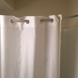 The shower curtain rod was installed incorrectly - meaning the water splashes all over the floor while you are showering.