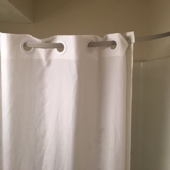 Super 8 by Wyndham Belleville - The shower curtain rod was installed incorrectly - meaning the water splashes all over the floor while you are showering. - Hotels Near Me - Belleville, Michigan