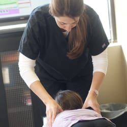 Sport and Spine Performance Institute - Dr. Baise performing a child adjustment
