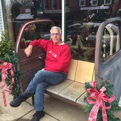 Expressions Flower Cottage of Landrum - Old car bench!