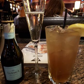 BJ's Restaurant & Brewhouse - All wine on Tuesdays are half off! This glass of prosecco was $4.25 what a steal! - American Near Me - Concord, California