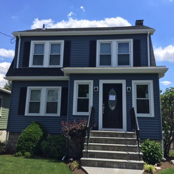 EM Snow - Pacific Blue Monogram Siding with PVC trim, new Therma Tru entry door and Charcoal Black CertainTeed Landmark Roof Roof - Roofing Near Me - Waltham, Massachusetts