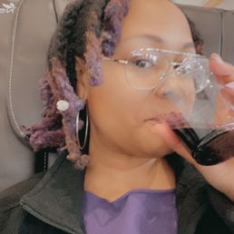 Sipping on a sangria during my deluxe pedicure