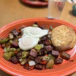 Geraldine's Counter - Corned beef hash with poached eggs, sub toast for biscuit (extra)