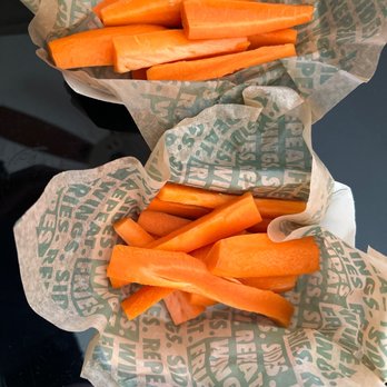 Wingstop - two baskets of carrots on a table - Chicken Wings Near Me - Westminster, California