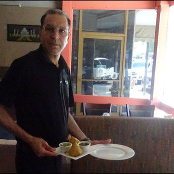 Royal Indian Cuisine - My host seemed slightly surprised as I snapped his photo, as he brought out my "Vegetarian Samosa" appetizer to me. - Indian Near Me - Auburn, California