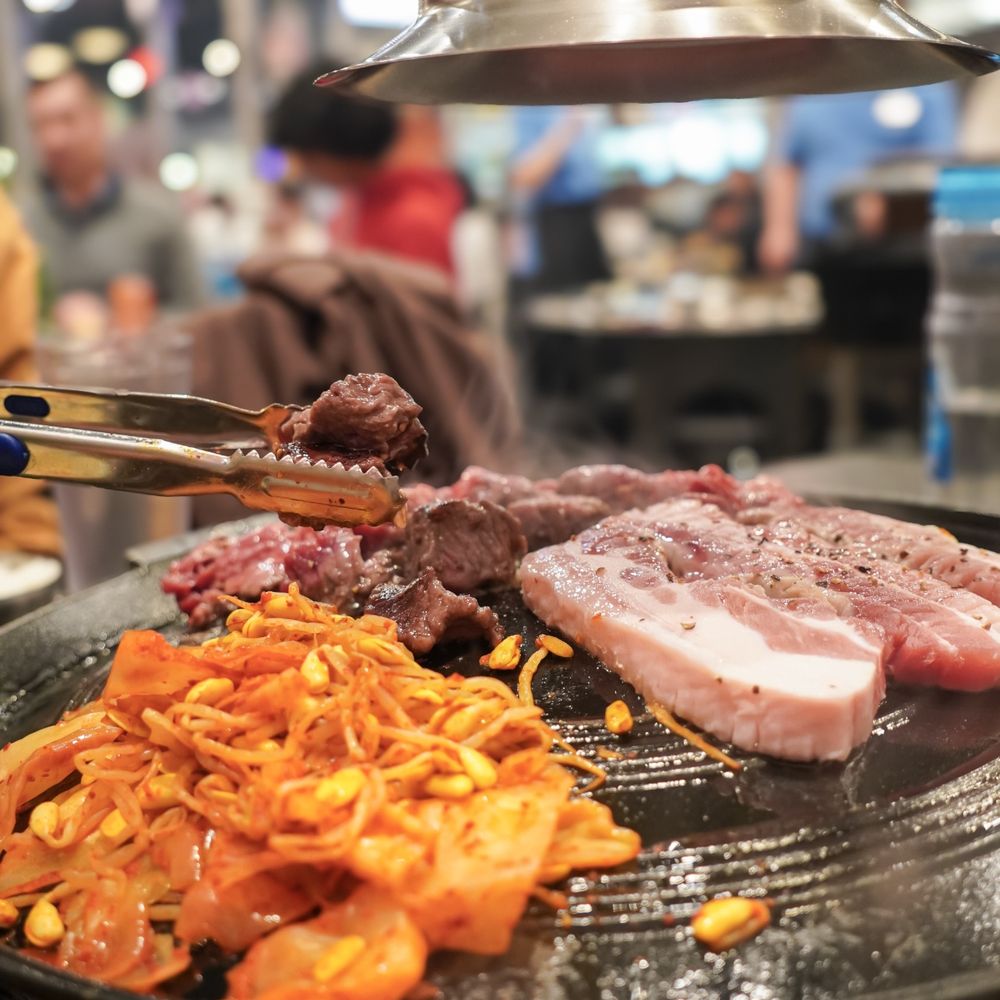 Honey Pig BBQ - a variety of food being prepared - Korean Near Me - Ashburn, Virginia Honey Pig BBQ - a variety of food being prepared - Korean Near Me - Ashburn, Virginia