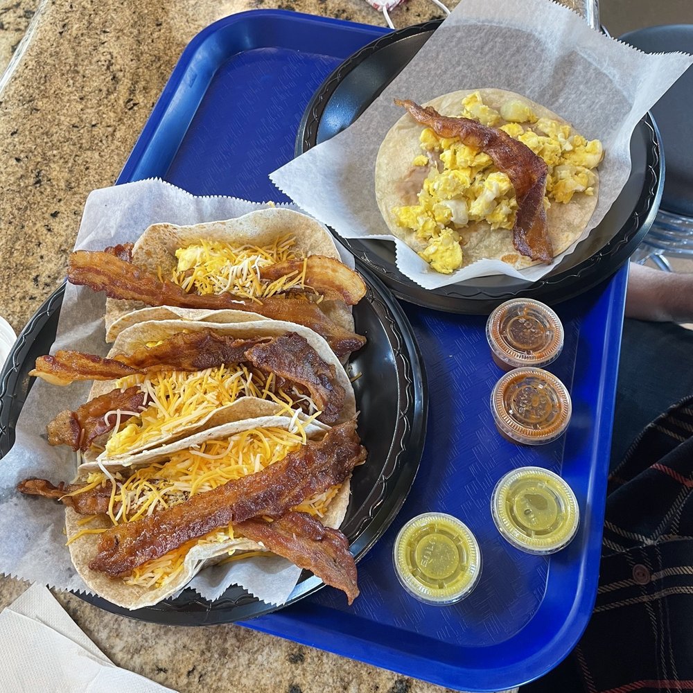 El Rey Taqueria - Bacon egg and cheese on wheat (left) egg, potato and cheese with bacon and beans (right). - Cuban Near Me - Katy, Texas