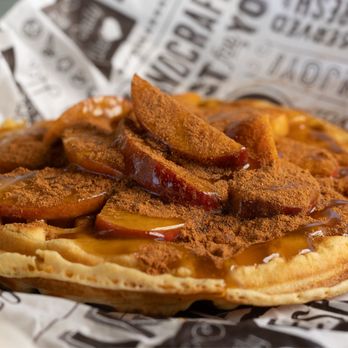 Park’er There - Peach Cobbler- Topped with fresh peach slices and a touch of cinnamon, finished with a sweet drizzle of mango - Waffles Near Me - McKinney, Texas Park’er There - Peach Cobbler- Topped with fresh peach slices and a touch of cinnamon, finished with a sweet drizzle of mango - Waffles Near Me - McKinney, Texas