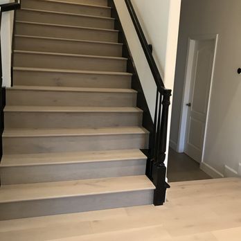 Grand Flooring - a staircase leading to a second floor - Flooring Near Me Grand Flooring - a staircase leading to a second floor - Flooring Near Me