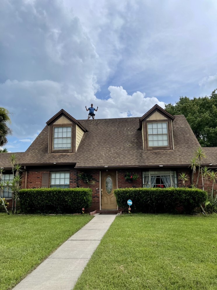 Slide of The Roofing Experts