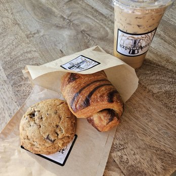 Experiment Coffee and Pastry - Chocolate Chip Peacan Cookie, Chocolate Croissant, Iced Honeycomb Latte - Coffee & Tea Near Me - Tempe, Arizona