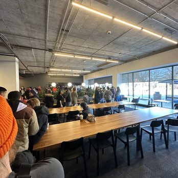 Slow Rise - The line snaking through Grand Coffee! - Donuts Near Me - Overland Park, Kansas Slow Rise - The line snaking through Grand Coffee! - Donuts Near Me - Overland Park, Kansas