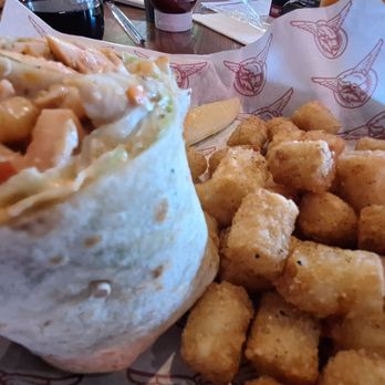 Taco Mac - Blazing chicken wrap with tots - Sports Bars Near Me - Buford, Georgia Taco Mac - Blazing chicken wrap with tots - Sports Bars Near Me - Buford, Georgia
