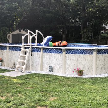 Backyard Masters - This is after having stone laid down and a border placed by our landscaper. - Hot Tub & Pool Near Me - Farmingdale, New York Backyard Masters - This is after having stone laid down and a border placed by our landscaper. - Hot Tub & Pool Near Me - Farmingdale, New York
