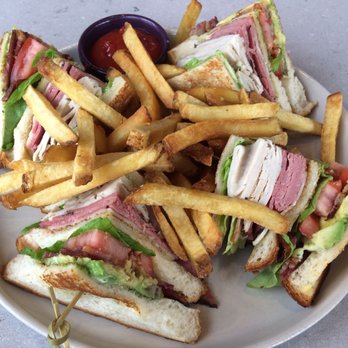Grille 254 - 254 Club: smoked turkey, pastrami, bacon, avocado, tomatoes, Bibb lettuce, Swiss, and basil mayo on white bread - American Near Me - San Antonio, Texas