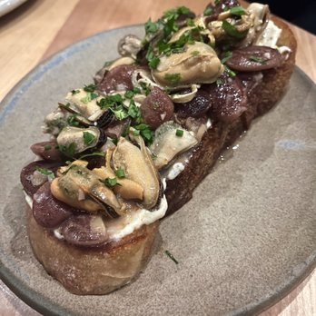Squable - Marinated MUSSELS on Grilled Bread ($17) - Modern European Near Me - Houston, Texas