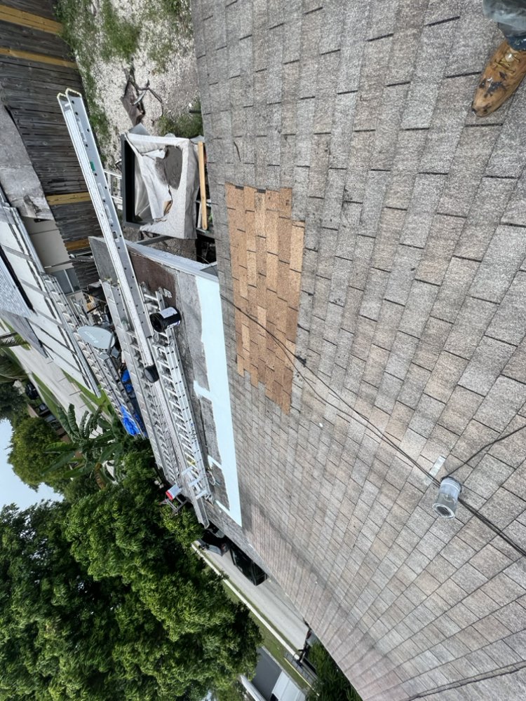 Slide of Combat Roofing Services