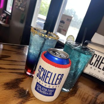 Scheller Playhouse - a can of scheller and two glasses of scheller - Pizza Near Me - Scheller, Illinois Scheller Playhouse - a can of scheller and two glasses of scheller - Pizza Near Me - Scheller, Illinois
