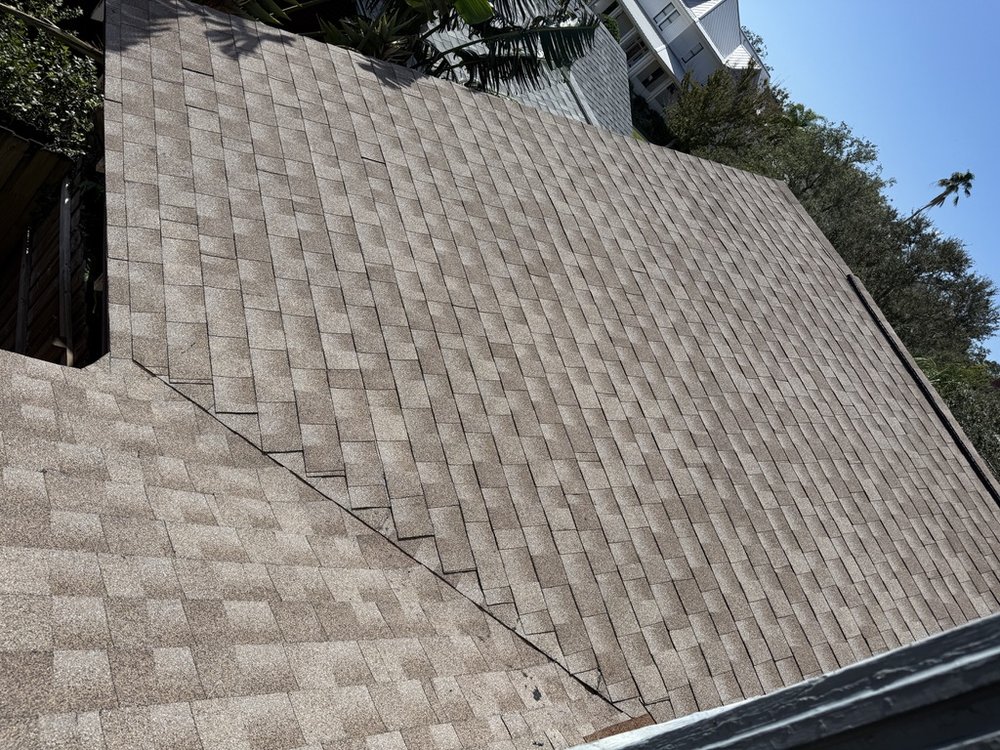 Slide of New Roofs Group