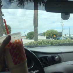 Dunkin' - Large iced caramel coffee with cream & sugar! Super simple, super cheap and lasts me through my classes!