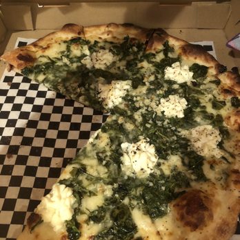 J. Dolan's - Partially devoured spinach and garlic pizza - Pizza Near Me - Honolulu, Hawaii J. Dolan's - Partially devoured spinach and garlic pizza - Pizza Near Me - Honolulu, Hawaii