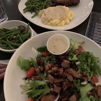Fernweh Distilling Co. - Tomahawk pork chop. Brisket salad with Paris vinaigrette. - Distilleries Near Me - Hermann, Missouri Fernweh Distilling Co. - Tomahawk pork chop. Brisket salad with Paris vinaigrette. - Distilleries Near Me - Hermann, Missouri