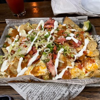 Fionn MacCool's - a tray of nachos - Irish Pub Near Me - Orillia, Ontario Fionn MacCool's - a tray of nachos - Irish Pub Near Me - Orillia, Ontario