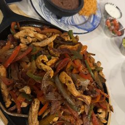 Chicken fajitas, refried beans & Mexican rice