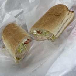 Adams Mart - Half a turkey sub with banana peppers, lettuce, tomato, cheese, mayo, oil. Delicious
