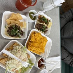 El Preferido Taco Shop - Michelada; 2 tacos, asada/carnitas; taquitos & cheese; chicken taquitos dressed with cabbage; one cabesa taco.