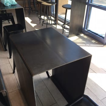 Poki One N Half - Seating. Tables for two and "bar" seating that faces outside - Poke Near Me - San Diego, California