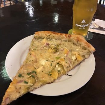 Bridger Brewing - Happy hour slice and Papa B's Joker Juice Session Hazy IPA - Breweries Near Me - Bozeman, Montana
