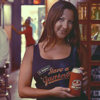 The Shamrock - a woman holding a cup of coffee - Irish Pub Near Me - Sarasota, Florida The Shamrock - a woman holding a cup of coffee - Irish Pub Near Me - Sarasota, Florida