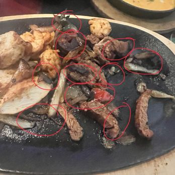 El Torito - Fajitas. Shrimp, chicken, steak. Nothing was eaten off this platter. Burnt food. The red circles are all burnt items. - Mexican Near Me - San Leandro, California El Torito - Fajitas. Shrimp, chicken, steak. Nothing was eaten off this platter. Burnt food. The red circles are all burnt items. - Mexican Near Me - San Leandro, California