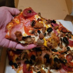 VJ's Sports Bar X Pizza - A Slice of a Combination Pizza