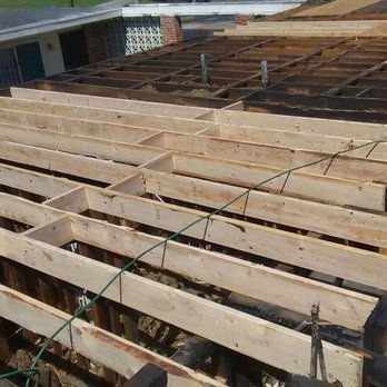 Trusty Roofing - Replacement new rafters for can install new plywood in crossover apartments. - Roofing Near Me