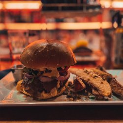 9oz House-Ground Burger with Steak fries Grilled Portabella & Onion Crispy Prosciutto | Lemon Aioli | Bravas