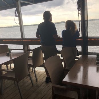 Backwaters on Sand Key - Outside seating with wild sea life dolphins, stingray, birds and ducks it's amazing - Seafood Near Me - Clearwater Beach, Florida Backwaters on Sand Key - Outside seating with wild sea life dolphins, stingray, birds and ducks it's amazing - Seafood Near Me - Clearwater Beach, Florida