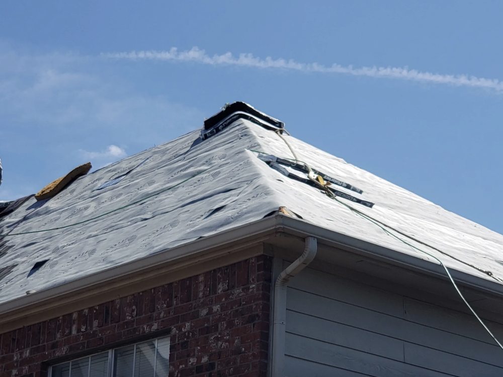 Slide of Harry's Roofing and Construction