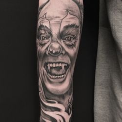 Paradise City Tattoo - Black and grey portrait tattoo done by Vinnie Stones at Paradise City Tattoo
